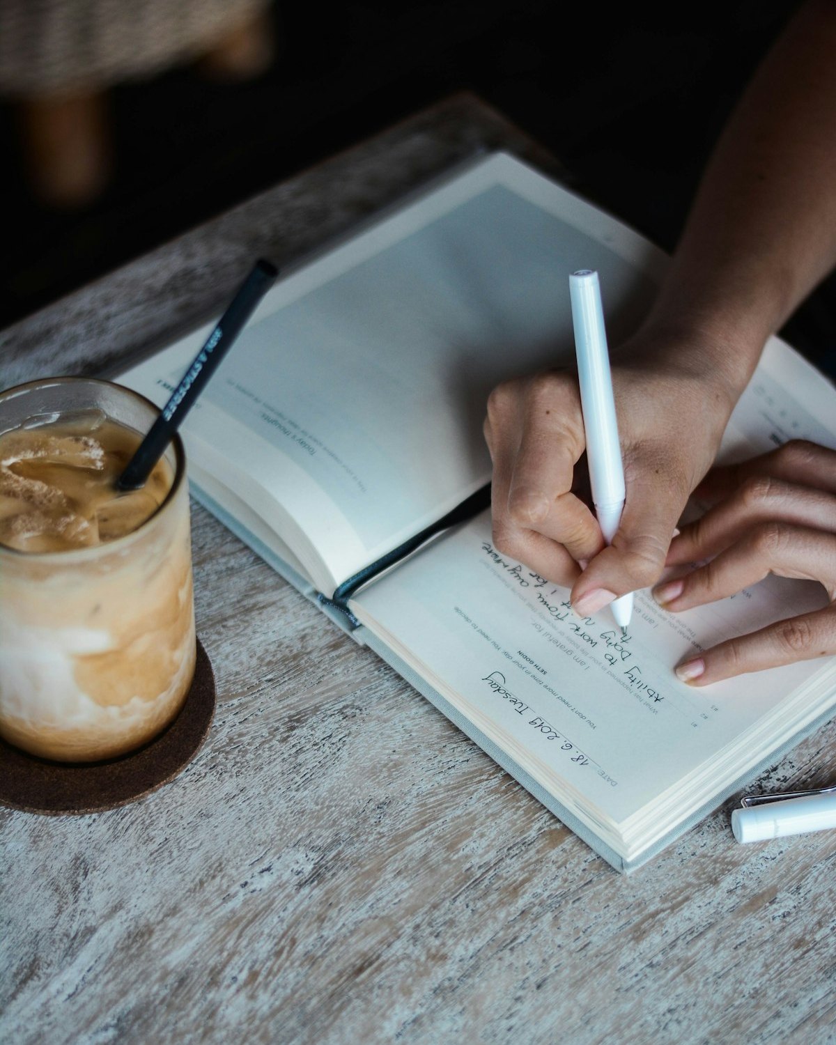 Woman journaling — doing the work